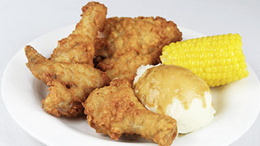 Fried chicken, corn, and mashed potatoes at the Captain's Table Buffet at Argosy Casino Alton.