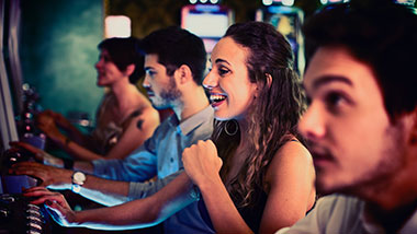 Young woman hitting a jackpot at Argosy Casino Alton.